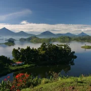 The Virunga volcanoes of Mgahinga seen across Lake Mutanda, Uganda